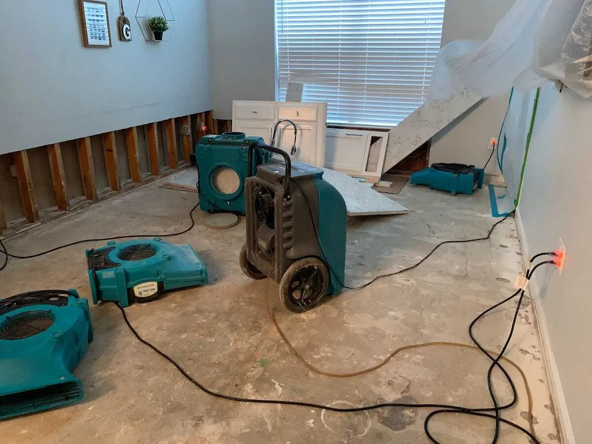 Dehumidifier in flood-cut room for Water Damage Restoration in Galveston