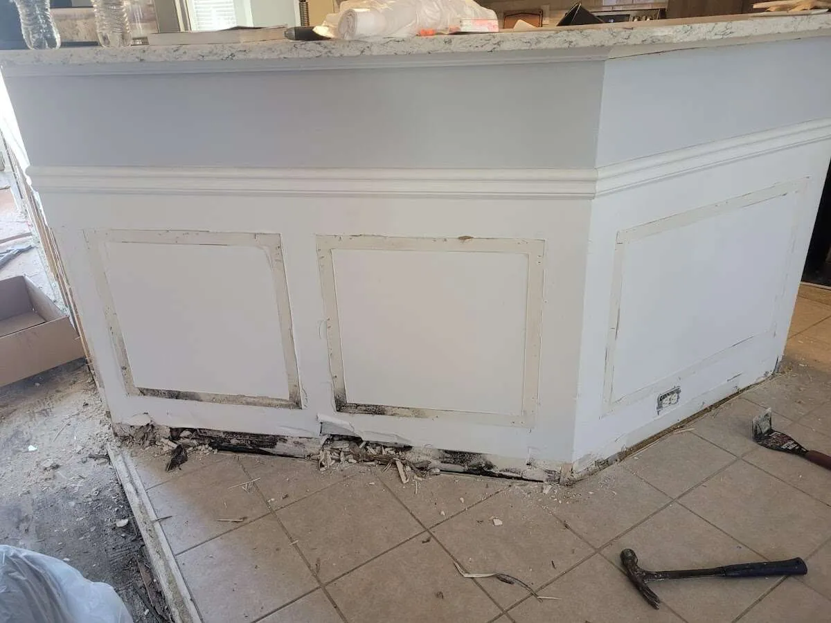 Water damage and mold on kitchen during Storm Damage Restoration in Galveston